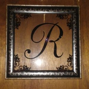 GLASS FRAMED LETTER "R".